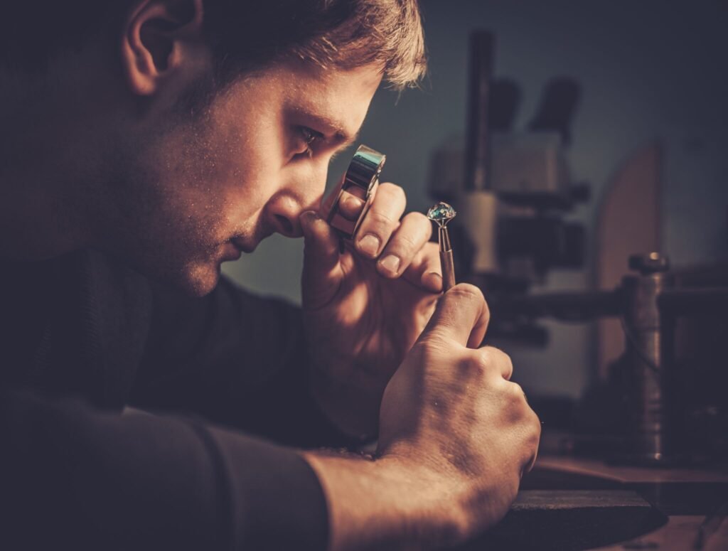 jeweler-looking-at-the-ring-through-microscope-in-2023-11-27-05-00-44-utc-2048×1550-1